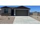 Charming single-story home featuring a stone facade, neutral stucco, and a spacious two-car garage in a desirable community at 25138 W Wayland Dr, Buckeye, AZ 85326