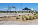 A well-maintained basketball court offers recreational opportunities for residents and families in the community at 25455 N 183Rd Dr, Wittmann, AZ 85361