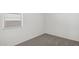 Neutral bedroom featuring a window, plush carpeting, and ample space at 25455 N 183Rd Dr, Wittmann, AZ 85361