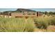 Inviting Rio Rancho community sign with decorative landscaping creates a welcoming entrance for residents and visitors at 25455 N 183Rd Dr, Wittmann, AZ 85361