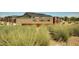 Inviting Rio Rancho community sign with decorative landscaping creates a welcoming entrance for residents and visitors at 25455 N 183Rd Dr, Wittmann, AZ 85361