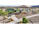 A community playground with slides and climbing structures offers a fun and safe environment for children to play at 25455 N 183Rd Dr, Wittmann, AZ 85361