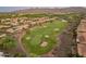 Aerial view of a golf course surrounded by homes in a residential community at 25995 W Sierra Pinta Dr, Buckeye, AZ 85396