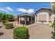 Serene backyard with covered patio and charming landscaping, perfect for outdoor living at 25995 W Sierra Pinta Dr, Buckeye, AZ 85396