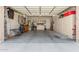 Open garage with built-in shelving and storage; ready for your projects! at 25995 W Sierra Pinta Dr, Buckeye, AZ 85396