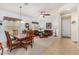Inviting living room and dining area with neutral tones and stylish furnishings create a comfortable and welcoming atmosphere at 25995 W Sierra Pinta Dr, Buckeye, AZ 85396