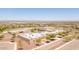 Aerial view of a large school building with sports fields in a residential neighborhood at 25995 W Sierra Pinta Dr, Buckeye, AZ 85396