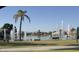 Beautiful lake view with multiple water fountains and park benches at 2922 N 107Th Dr, Avondale, AZ 85392