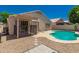 Backyard swimming pool with an outdoor lounge area at 2922 N 107Th Dr, Avondale, AZ 85392
