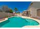 Backyard swimming pool with patio and lounge chairs at 2922 N 107Th Dr, Avondale, AZ 85392