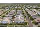 Aerial view of a residential neighborhood with a home featuring a pool and patio at 3163 E Austin Dr, Gilbert, AZ 85296