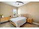 Serene bedroom with carpet, neutral walls, plantation-shuttered windows, simple decor and comfortable furniture at 35971 N Prickley Pear Rd, Cave Creek, AZ 85331