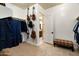Spacious closet featuring guitars as decorations, carpeted floors, and an entrance to an adjacent bathroom at 35971 N Prickley Pear Rd, Cave Creek, AZ 85331