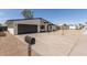 Well maintained single-story home featuring a low maintenance desert landscape and a two car garage at 3752 W Becker Ln, Phoenix, AZ 85029