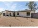 Charming single-story home featuring a low maintenance desert landscape and a two car garage at 3752 W Becker Ln, Phoenix, AZ 85029
