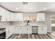 Bright kitchen with stainless steel dishwasher and sink, updated cabinets and countertops at 3752 W Becker Ln, Phoenix, AZ 85029