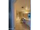 Bathroom featuring a tub, shower head, sink, tile floors, and a mirror at 3914 E Andorra Dr, Phoenix, AZ 85032