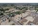 This aerial view shows the large lot in a neighborhood with mature trees and homes nearby at 40458 N Prince Ave, San Tan Valley, AZ 85140