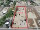 This aerial view shows a large 3.5 acre lot, bordered in red, with plenty of space for development at 40458 N Prince Ave, San Tan Valley, AZ 85140