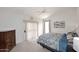Comfortable bedroom featuring a slider door, ample natural light, and generous space at 4081 N 156Th Dr, Goodyear, AZ 85395