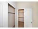 Large closet with adjustable shelving and two sliding doors, provides efficient storage space at 4081 N 156Th Dr, Goodyear, AZ 85395