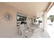 Inviting covered patio with comfortable seating, perfect for relaxing and enjoying the outdoors at 4081 N 156Th Dr, Goodyear, AZ 85395