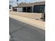 Charming single-story home featuring an attached garage, arched entryway, and desert-friendly landscaping at 5211 W Beryl Ave, Glendale, AZ 85302