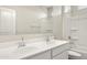 Modern bathroom with double sinks, a large mirror, and a shower-tub combination at 5812 E Freesia Ln, San Tan Valley, AZ 85140