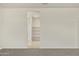 Bathroom area featuring a walk-in shower and linen closet at 5812 E Freesia Ln, San Tan Valley, AZ 85140