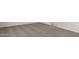 Neutral carpet flooring with baseboard trim and electrical outlet at 5812 E Freesia Ln, San Tan Valley, AZ 85140