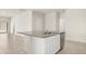 Modern kitchen island with granite countertop and stainless steel dishwasher at 5812 E Freesia Ln, San Tan Valley, AZ 85140