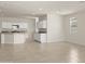 Open kitchen with stainless steel appliances, island, granite countertops and recessed lighting at 5812 E Freesia Ln, San Tan Valley, AZ 85140