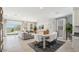 Bright, open-concept living area with modern furnishings and plenty of natural light at 5812 E Freesia Ln, San Tan Valley, AZ 85140