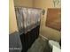 Bathroom featuring a grey shower curtain and a toilet at 7326 W Dreyfus Dr, Peoria, AZ 85381