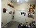 A small bedroom with ample storage features and carpeted floors at 7326 W Dreyfus Dr, Peoria, AZ 85381