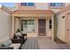 Charming covered patio with outdoor seating and a decorative rug at 7844 E Rovey Ave, Scottsdale, AZ 85250