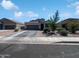 Attractive single-Gathering home with a two-car garage and desert landscaping at 1237 E Paul Dr, Casa Grande, AZ 85122