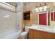 Bathroom with a shower-tub combination, modern vanity, toilet and stylish fixtures at 15313 W Pantano Dr, Surprise, AZ 85374
