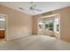 Bright bedroom with a bay window that allows lots of natural light, neutral walls and carpet at 15313 W Pantano Dr, Surprise, AZ 85374