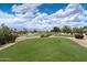 Expansive view of the golf course, showcasing manicured greens and mature landscaping at 15313 W Pantano Dr, Surprise, AZ 85374
