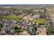 An aerial view highlights the community's layout and its nearness to schools and other establishments at 15507 W Marconi Ave, Surprise, AZ 85374