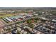 A neighborhood aerial view showcases the home's location and proximity to nearby amenities at 15507 W Marconi Ave, Surprise, AZ 85374