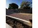 An expansive backyard with well-maintained rock landscaping and planting area at 15742 W Central St, Surprise, AZ 85374