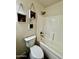 Bright bathroom featuring a shower-tub combination with decorative plants at 15742 W Central St, Surprise, AZ 85374