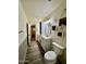 Bathroom with modern vanity, neutral color palette, and decorative plants at 15742 W Central St, Surprise, AZ 85374