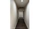 Hallway with hardwood flooring and recessed lighting leading to various rooms at 15742 W Central St, Surprise, AZ 85374