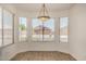 Dining area bathed in natural light with tiled floors, perfect for enjoying meals at 16120 N 86Th Ln, Peoria, AZ 85382