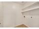 Laundry room featuring tile floors and shelving, with washer and dryer hookups at 16120 N 86Th Ln, Peoria, AZ 85382