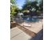 Sparkling fenced in pool featuring a ladder and lush landscaping at 1725 E Coconino Dr, Chandler, AZ 85249