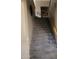 Carpeted staircase with wooden railing leading to the upper level of the home at 1725 E Coconino Dr, Chandler, AZ 85249